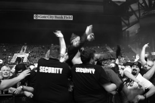 Security managing crowd surfers during Ministry's set - photograph by Sabrina Hornung