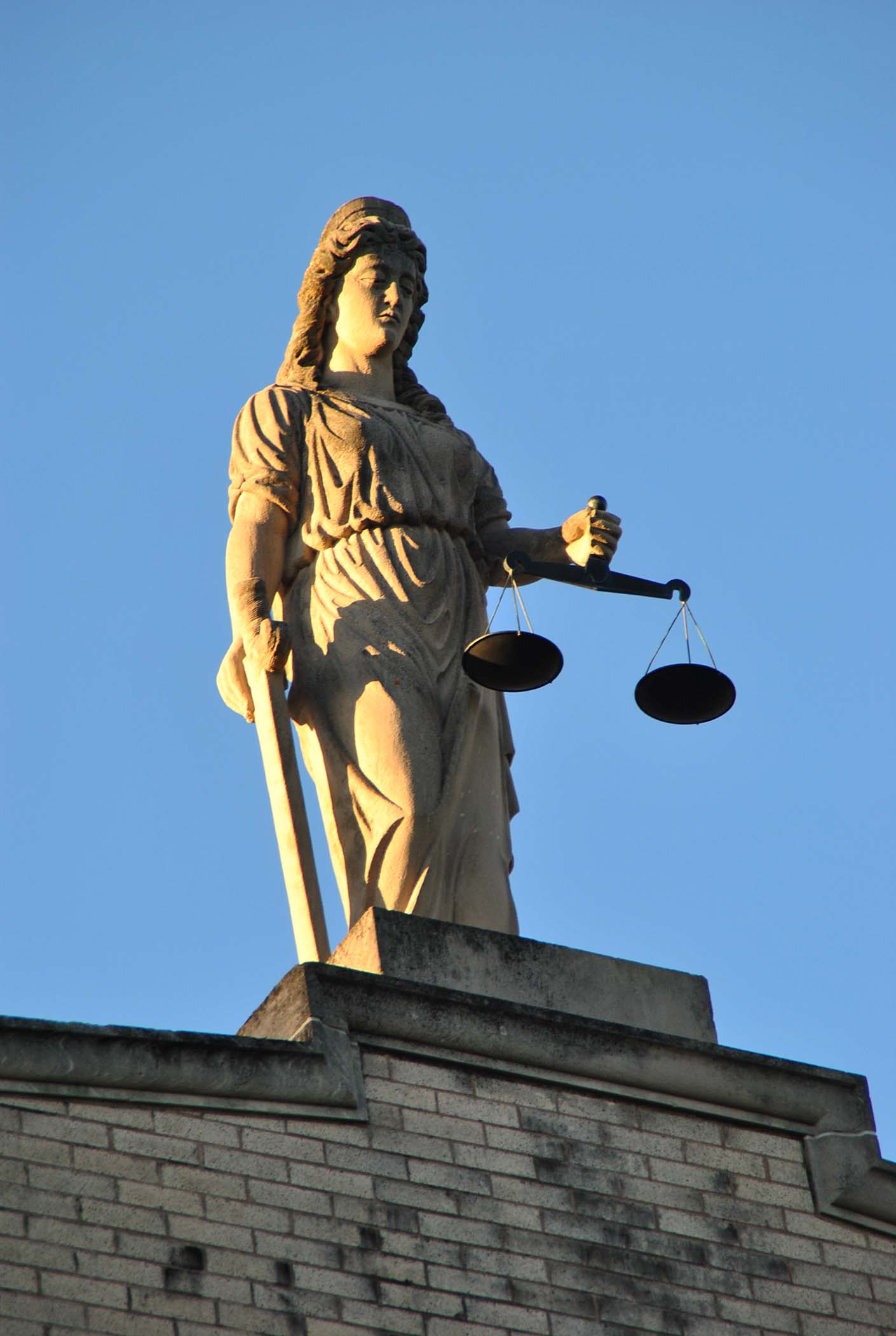 Lady Justice atop the Pembina County Courthouse - photo by C.S. Hagen