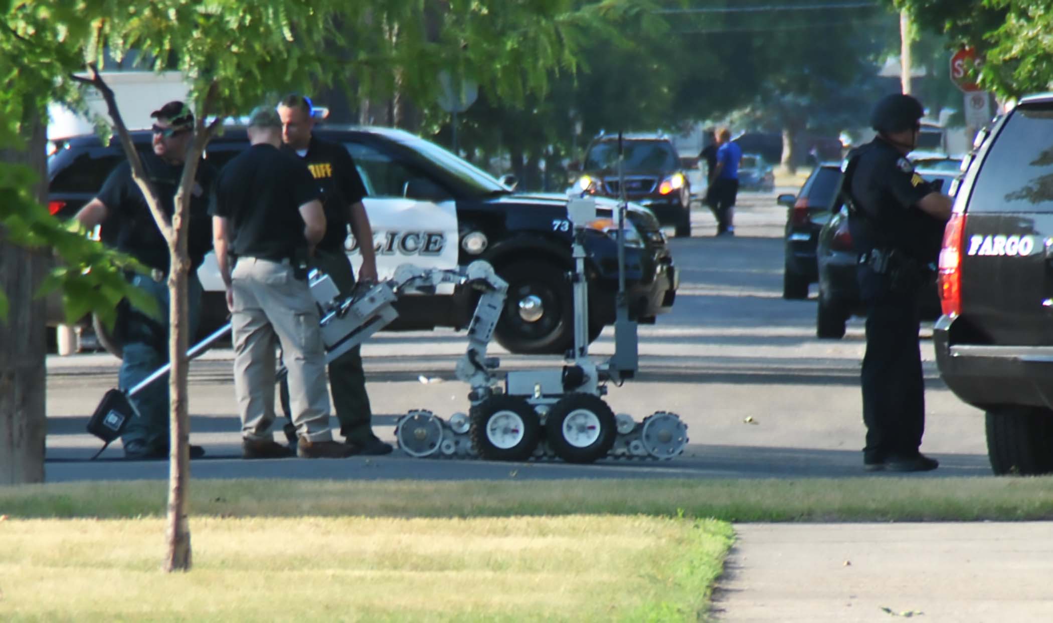 Police robot coming out of the apartment - photo by C.S. Hagen