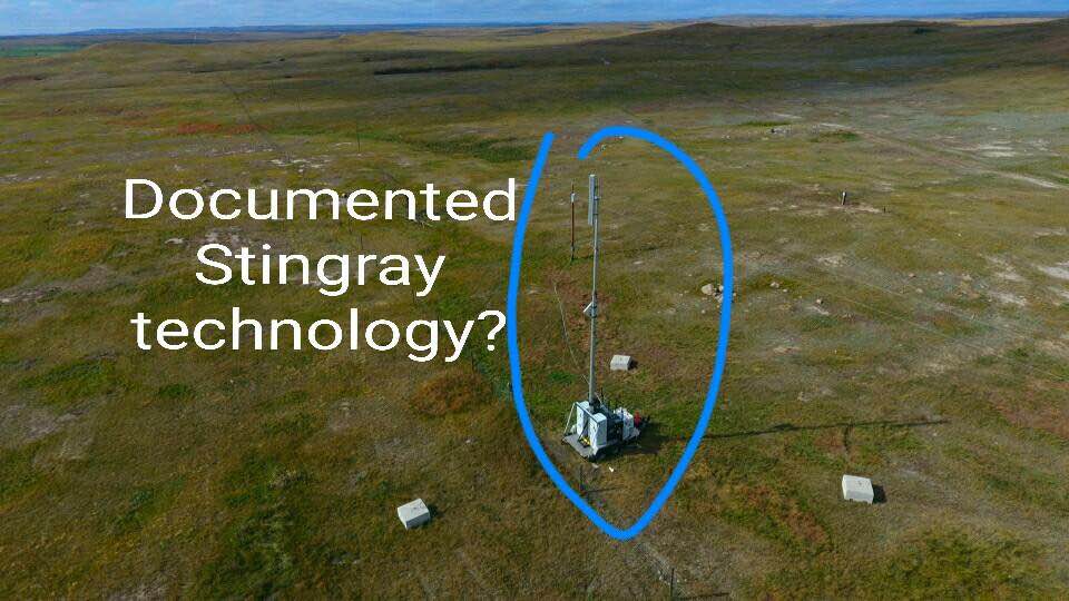 Semi-mobile Stingray rogue field intercept cell tower antenna array with collection and detection gear powered by a grid utility pole with a battery backup - according to two IT specialists