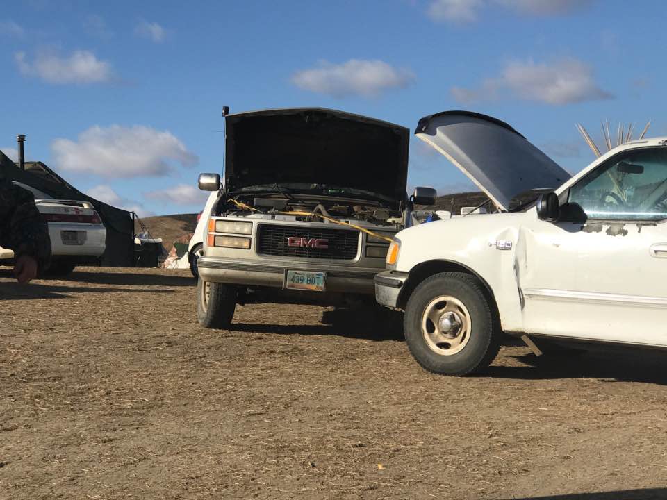 Two automobiles that suddenly lost battery power at Standing Rock camps - photo provided by Myron Dewey